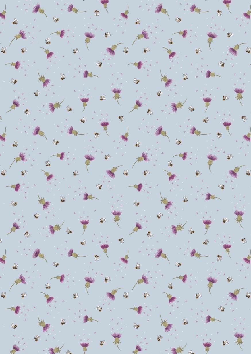 Bee Thistle in Blue from A Celtic Summer collection by Lewis & Irene featuring ditsy motif of delicate thistles and bees on sky blue fabric.