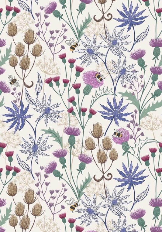 Celtic Floral fabric in Cream from A Celtic Summer collection by Lewis and Irene features buzzing bees in a floral meadow dotted with thistles against a sky blue background.
