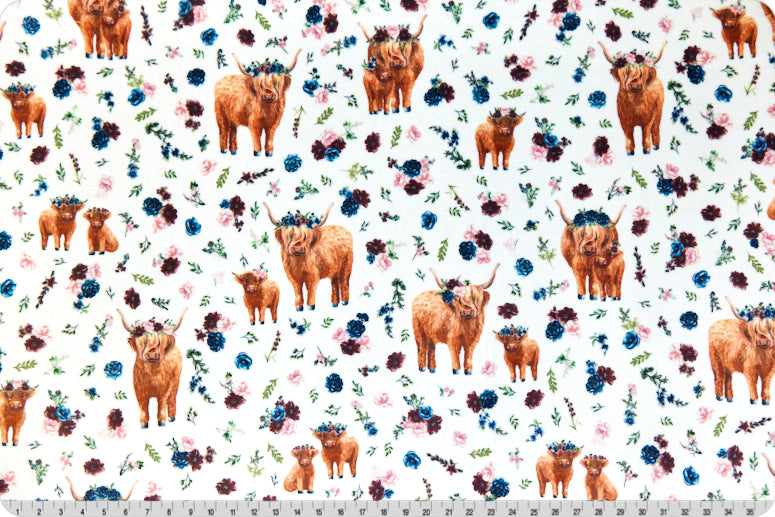 A 3 Yard sampling of the Helga Highland Cuddle Cut to demonstrate the pattern of large and mini highland cows with florals at scale.