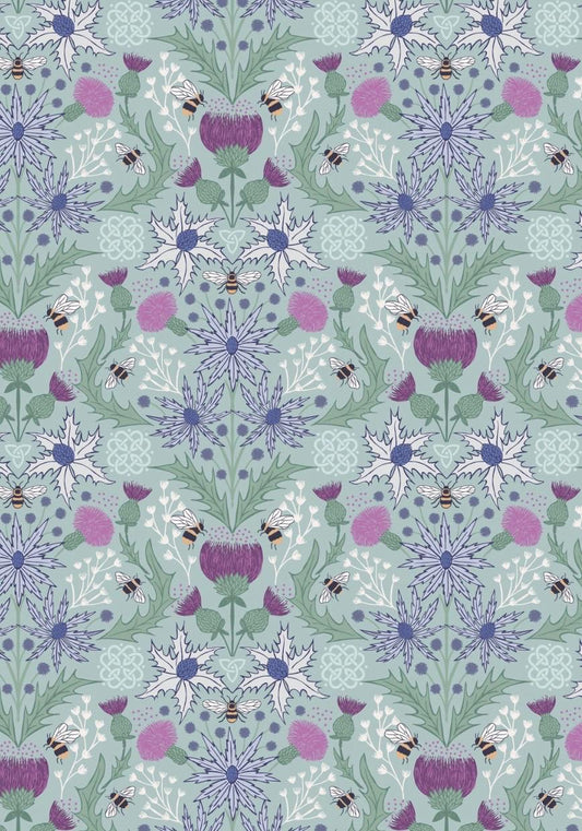 Mirrored thistle and bee fabric in duck egg blue from A Celtic Summer collection by Lewis & Irene featuring scottish thistle, bumbling bees, and celtic knots for a floral pattern reminiscent of highland meadows.