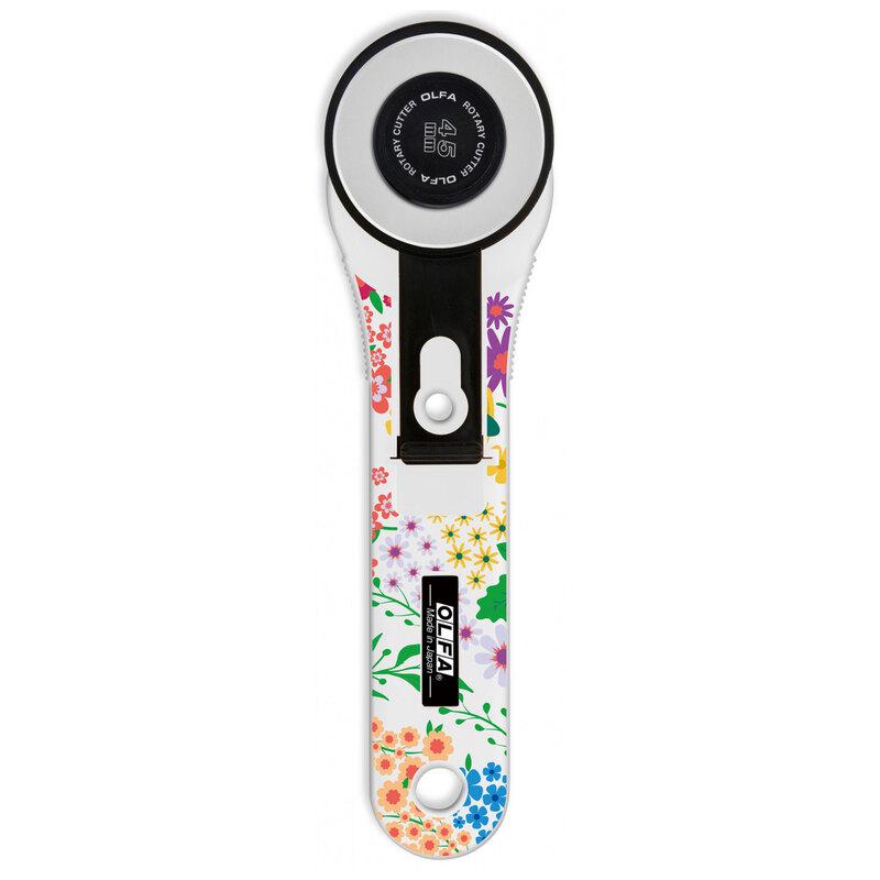 The white handle of this classic 45mm rotary cutter is decorated with a rainbow assortment of floral designs.