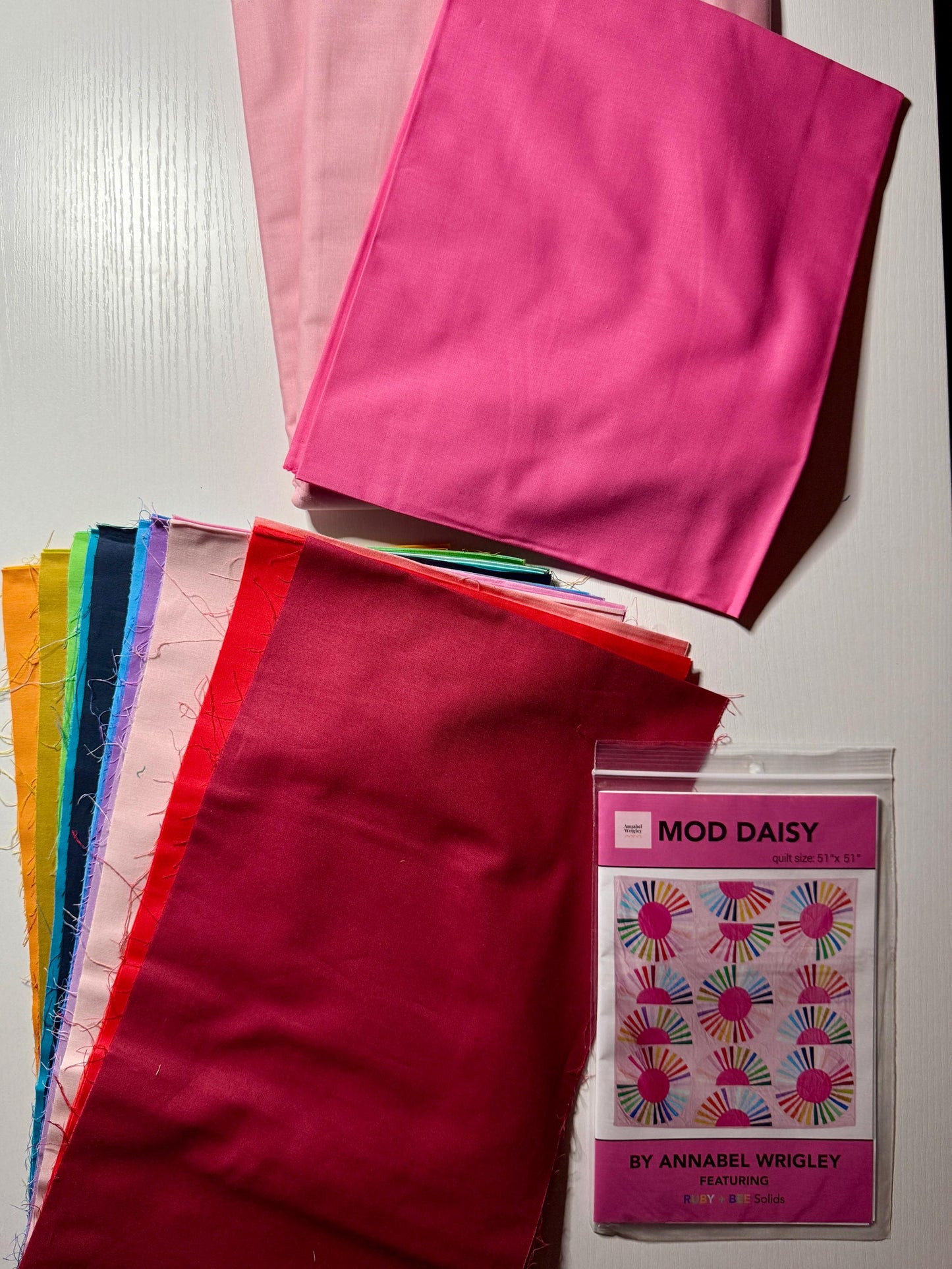 Mod Daisy Quilt Kit featuring Ruby & Bee solids by Windham fabrics. Pattern included